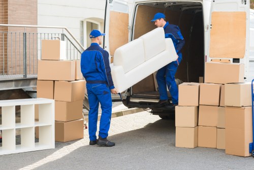 Professional movers handling furniture in Elephant and Castle