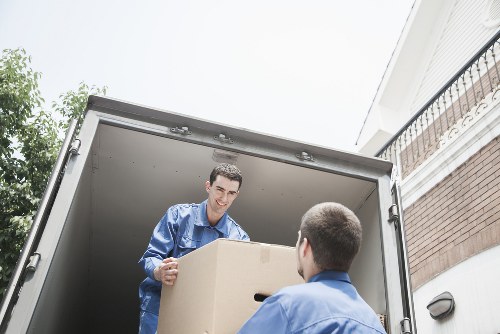 Commercial office movers handling desks and equipment in South London